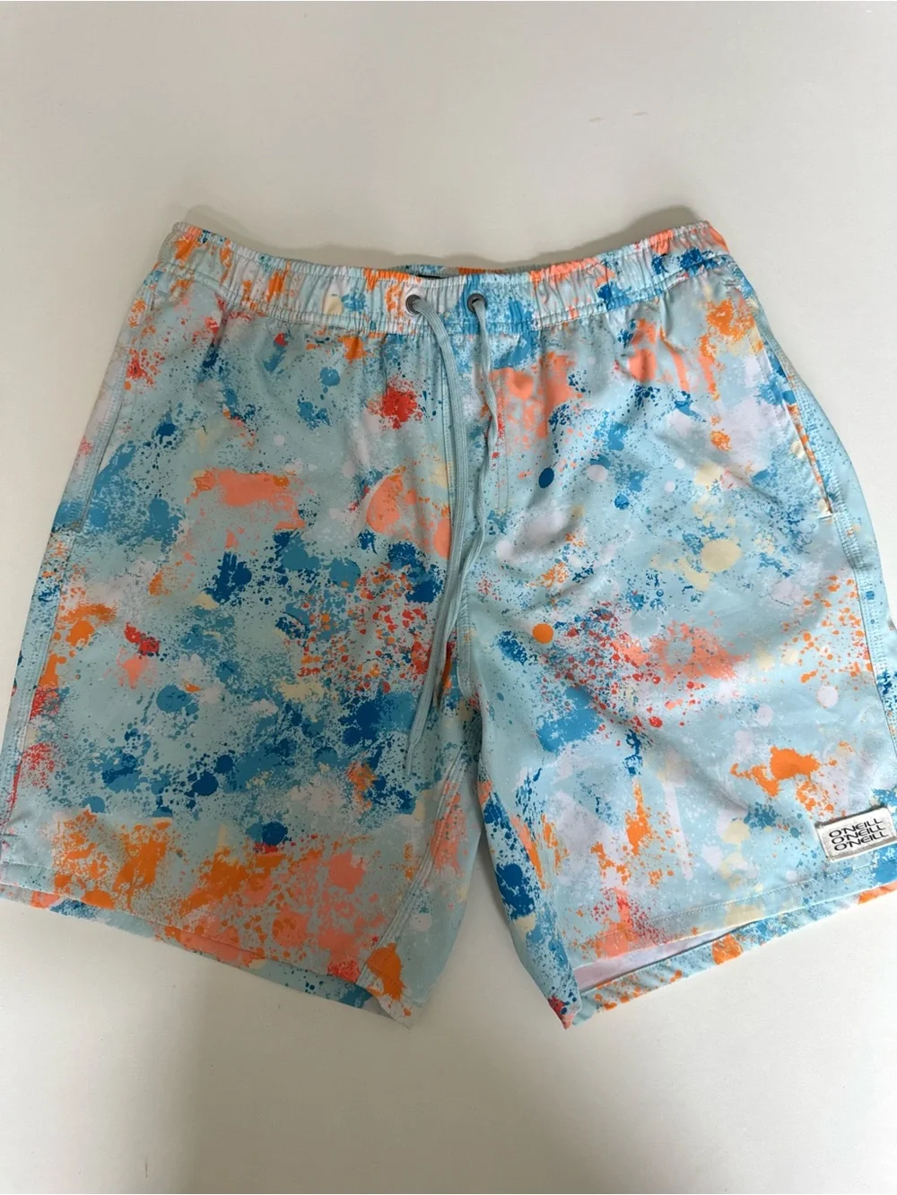 O'Neill Light Blue Swim Trunks 17” with Orange & Blue Splash Print